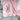 A close up of a pale pink fleece baby blanket decorated with a Liberty fabric floral rabbit and a gold glitter name.