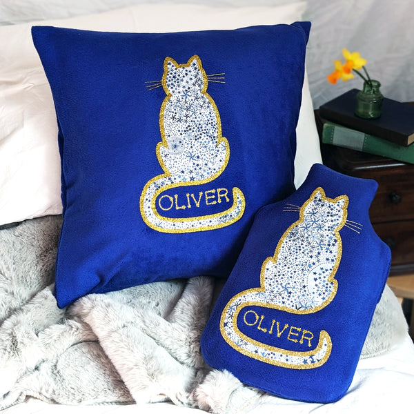 Personalised cushion and hot water bottle cover with starry cat and gold glitter name. Gift set.