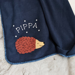 Navy fleece blanket with glitter hedgehog decoration and name